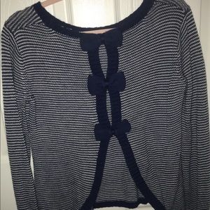 Pretty blue blouse with bows on the back!